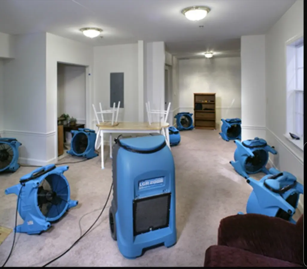 Air movers and dehumidifier setup for Water Damage Restoration in Margate
